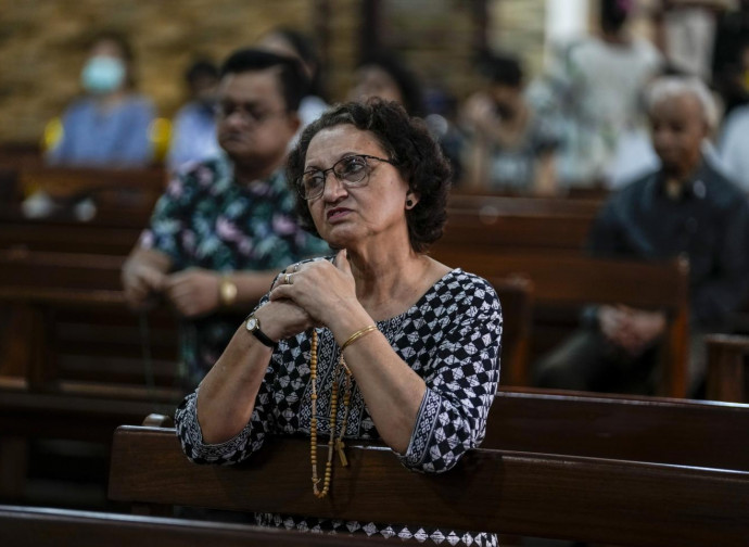 Cristiani in preghiera in India (foto LaPresse)