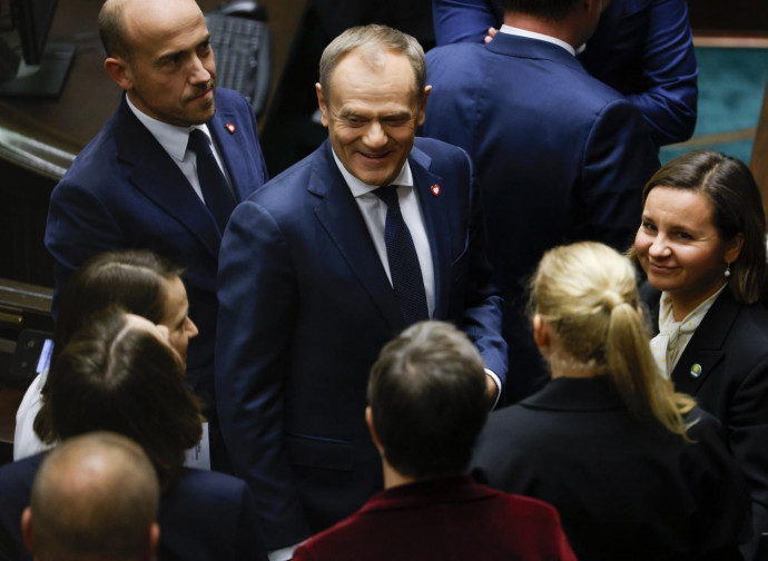 Donald Tusk (al centro, foto AP by LaPresse)