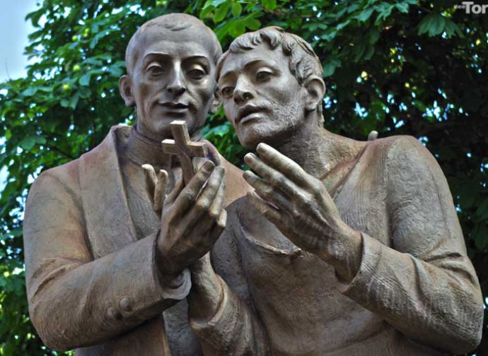 Il monumento a San Cafasso con un condannato a morte Il monumento a San Cafasso con un condannato a morte
