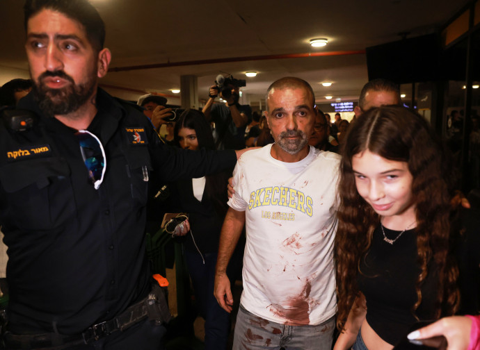 Yaniv Hayun (al centro) (AP)
