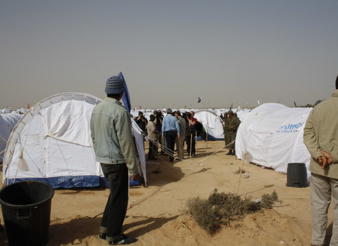 Campo di transito dell'Unhcr al confine libico-tunisino Campo di transito dell'Unhcr al confine libico-tunisino
