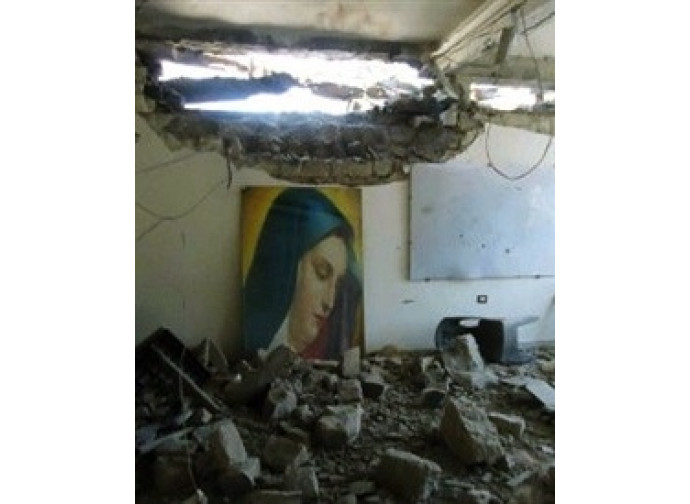 Una chiesa bombardata ad Aleppo Una chiesa bombardata ad Aleppo
